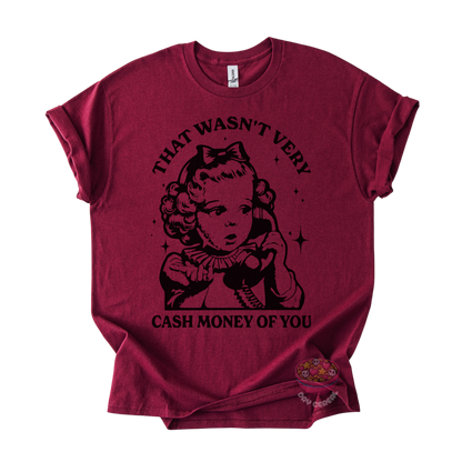 A maroon short-sleeve t-shirt with a black graphic print of a retro cartoon girl holding a phone, with the text 'THAT WASN'T VERY CASH MONEY OF YOU' on the front.