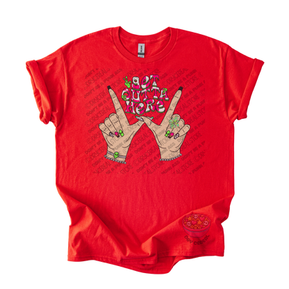 Red unisex T-shirt featuring the phrase "Get Outta Here" above Y2K-inspired hands making the iconic gesture with colorful nails, alien accents, bracelets, and retro lettering.