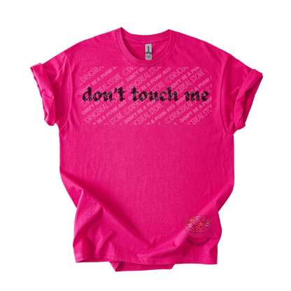 Hot pink unisex tee featuring the phrase "don't touch me" in bold gothic black lettering across the chest.
