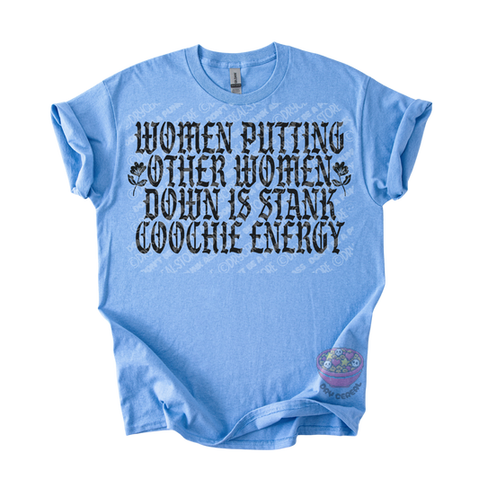 A light blue short-sleeve t-shirt with a distressed black graphic text that reads 'WOMEN PUTTING OTHER WOMEN DOWN IS STANK COOCHE ENERGY' on the front, displayed flat against a white background.