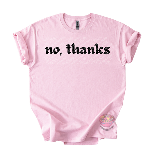 Light pink unisex T-shirt featuring the phrase "No, thanks" in bold black gothic lettering across the chest.