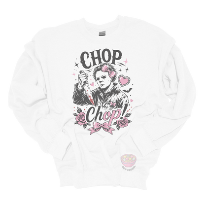 White crewneck sweatshirt featuring a spooky cute slasher-inspired design with pink bows, hearts, roses, bats, and the phrase "Chop Chop."