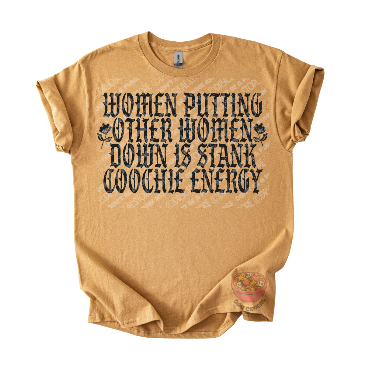 A tan short-sleeve graphic t-shirt laid flat on a white background. The shirt features a distressed black text graphic that reads 'WOMEN PUTTING OTHER WOMEN DOWN IS STANK COOCHE ENERGY' with small floral illustrations.