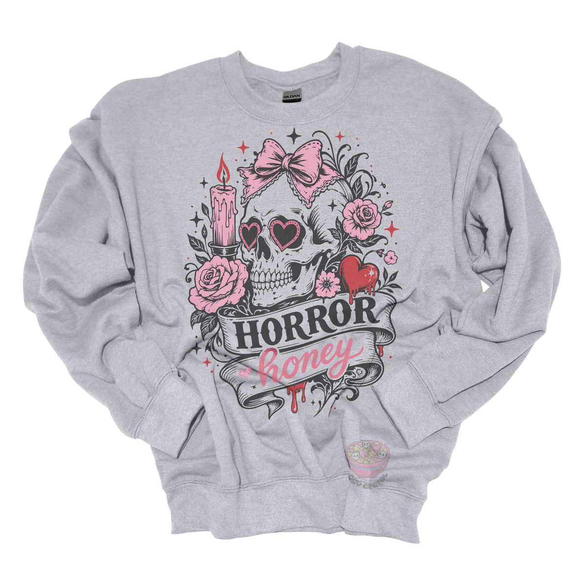 Light gray crewneck sweatshirt featuring a vintage skull with heart-shaped sunglasses, pink bow, roses, candle, dripping heart, and the phrase "Horror Honey" in a spooky gothic design.