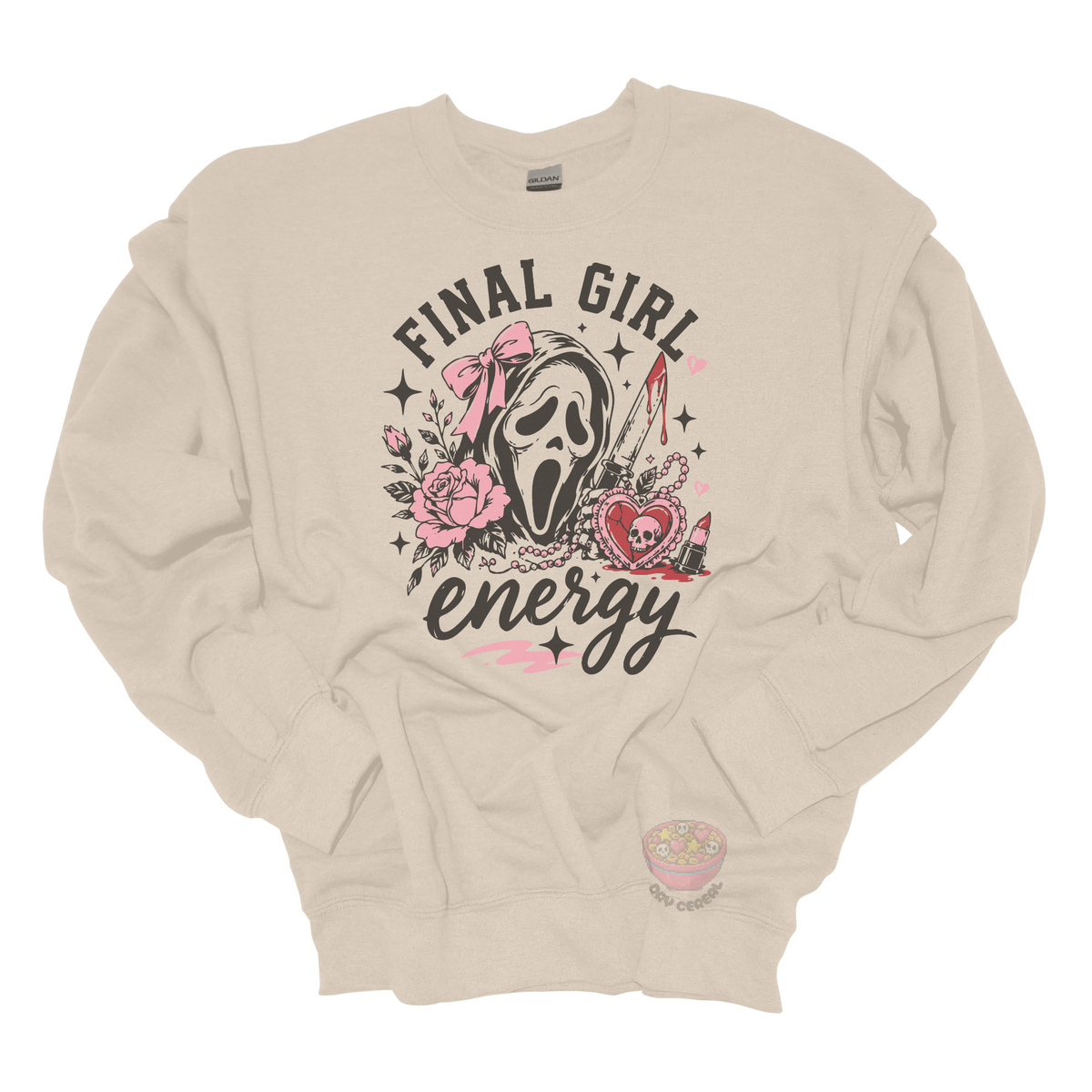 Beige crewneck sweatshirt featuring a horror-inspired ghost mask design with pink roses, a bloody knife, heart locket, lipstick, and the phrase "Final Girl Energy."