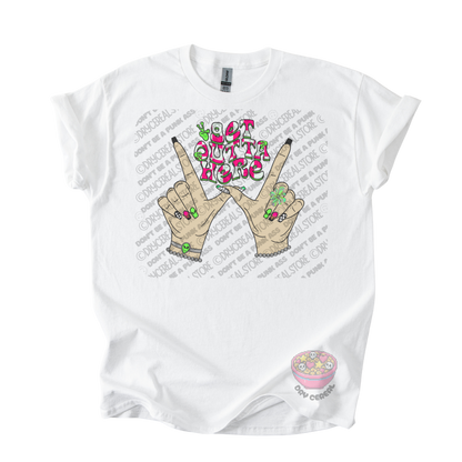 White unisex T-shirt featuring the phrase "Get Outta Here" above Y2K-inspired hands making the iconic gesture with colorful nails, alien accents, bracelets, and retro lettering.