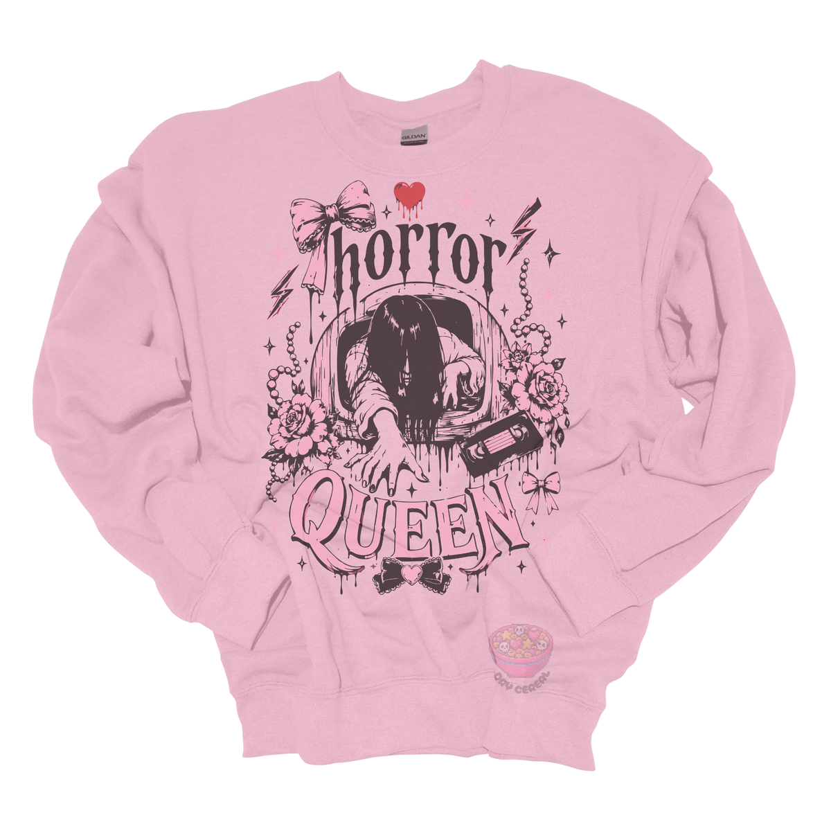 Light pink crewneck sweatshirt featuring a horror-inspired long-haired ghost emerging from a television, surrounded by pink bows, roses, pearls, lightning bolts, and the phrase "Horror Queen."