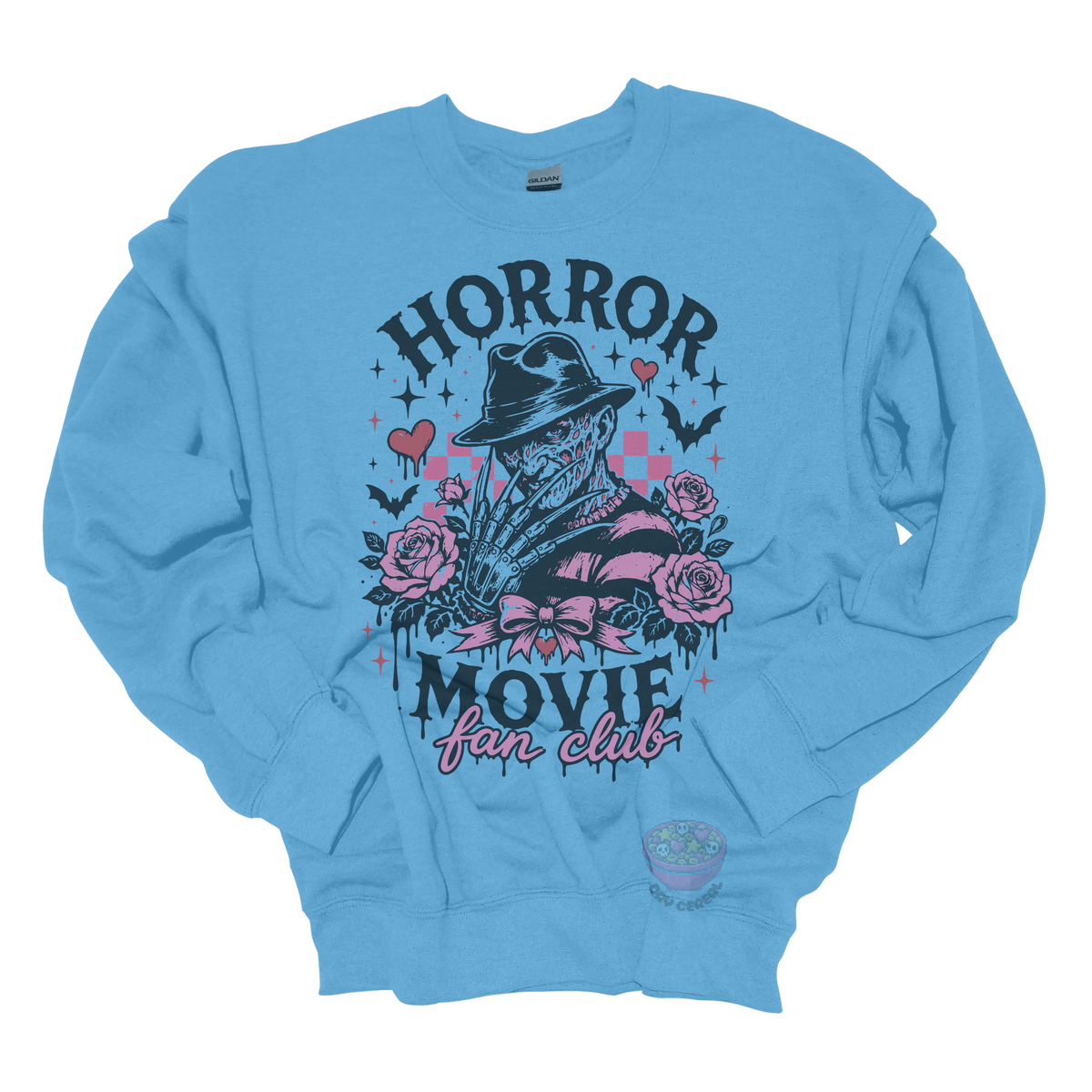 Light blue crewneck sweatshirt featuring a horror-inspired burned slasher character surrounded by pink roses, bats, bows, hearts, and the phrase "Horror Movie Fan Club" in a spooky vintage design.