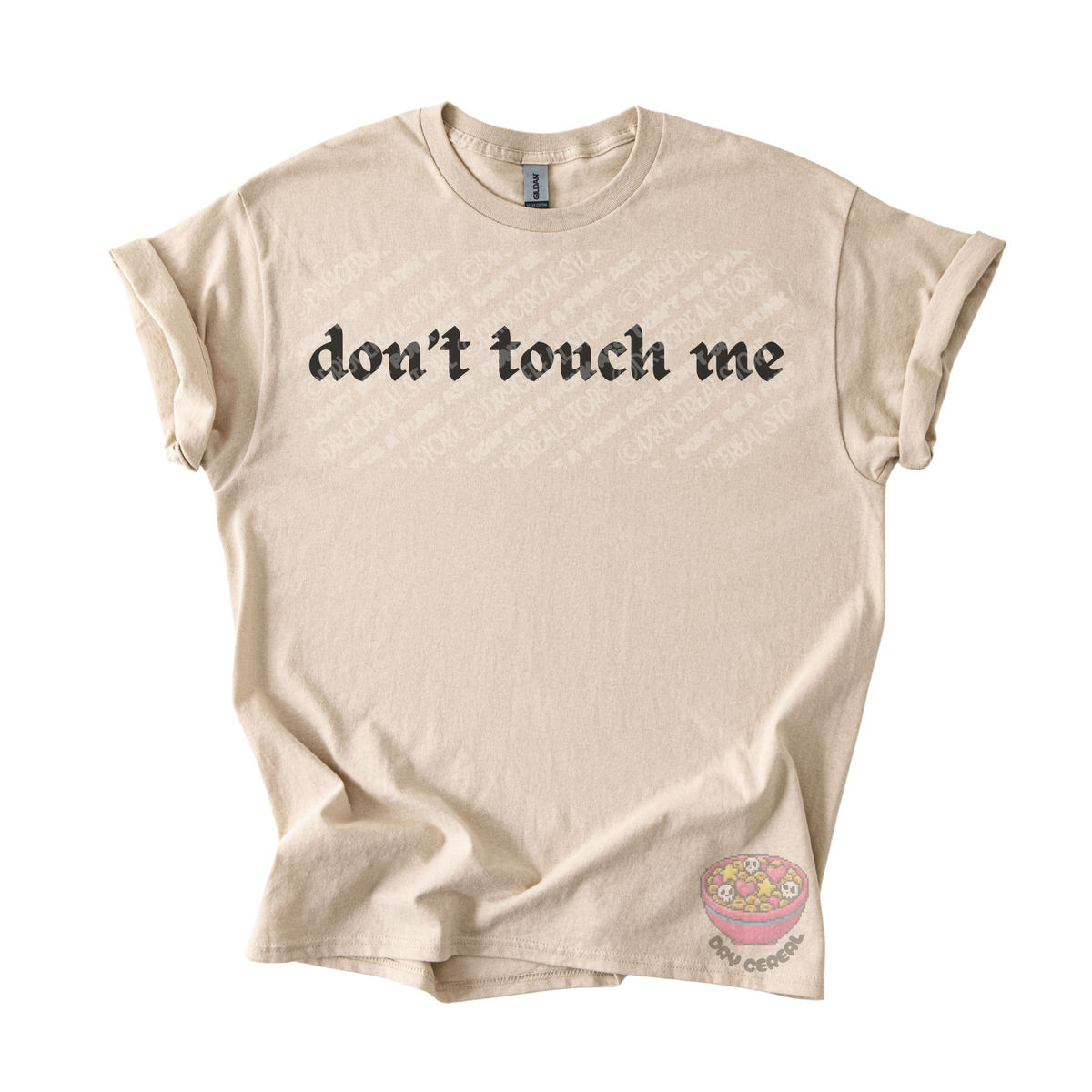 Sand unisex tee featuring the phrase "don't touch me" in bold gothic black lettering across the chest.