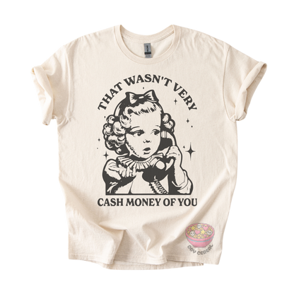 An off-white short-sleeve graphic t-shirt featuring a black-and-white retro illustration of a young girl on a telephone with the text 'THAT WASN'T VERY CASH MONEY OF YOU'.