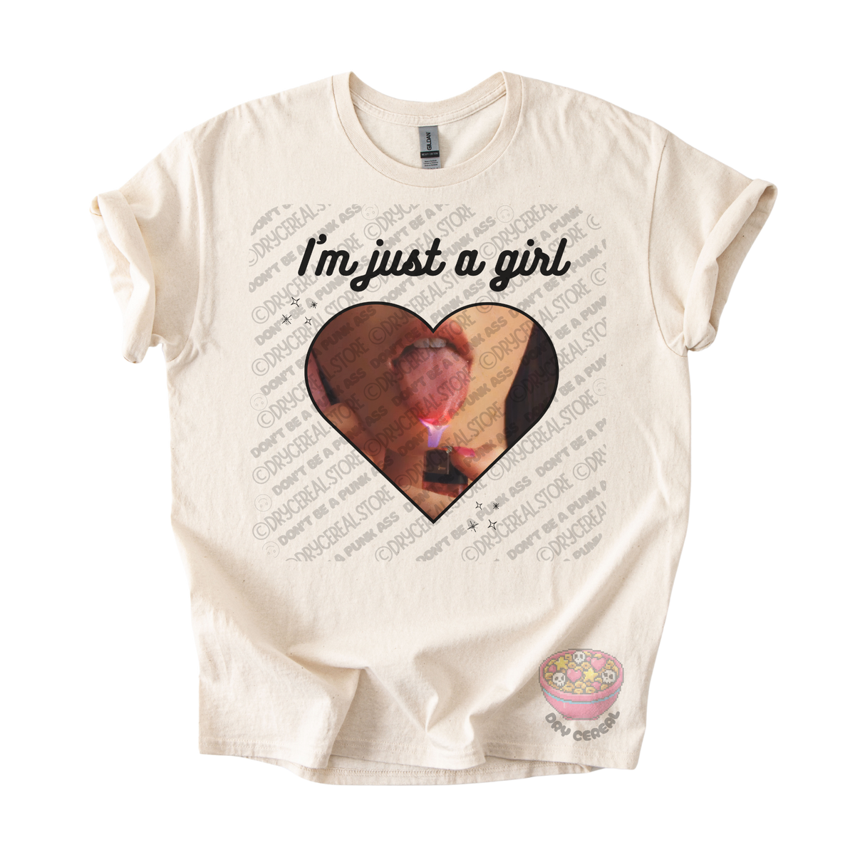 Natural unisex T-shirt featuring the phrase "I'm just a girl" above an original heart-shaped collage graphic with an edgy alternative aesthetic