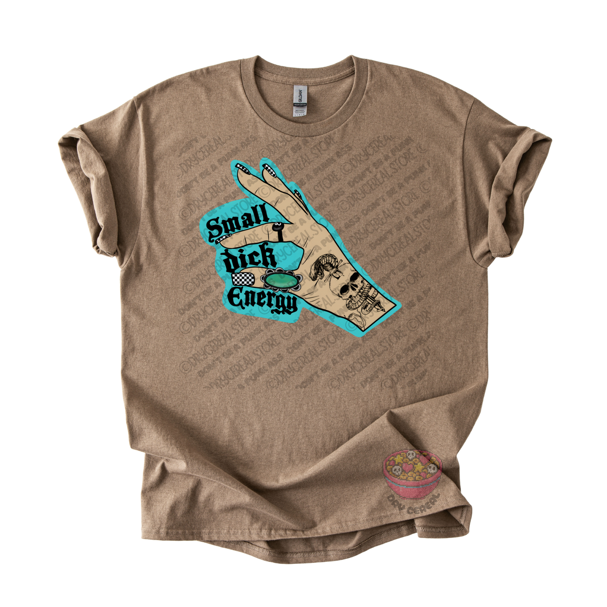 A brown graphic t-shirt featuring a hand graphic with the text 'Small dick Energy' in black with a turquoise outline, displayed on a clean white background.