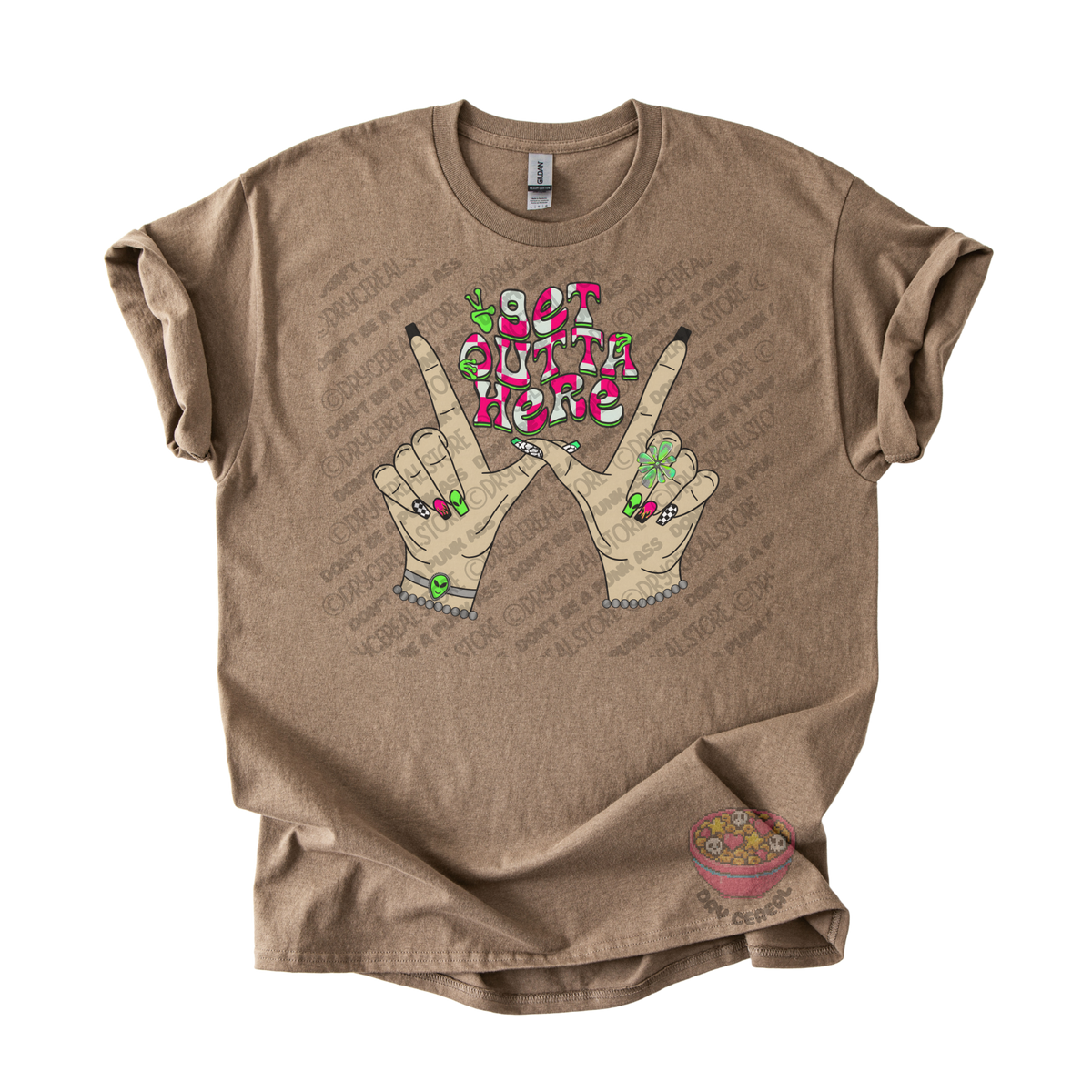 Light brown unisex T-shirt featuring the phrase "Get Outta Here" above Y2K-inspired hands making the iconic gesture with colorful nails, alien accents, bracelets, and retro lettering.